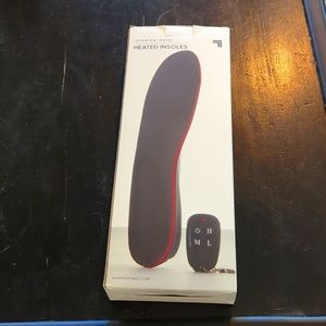 Sharper Image heated insoles. New, never used. Size Large.